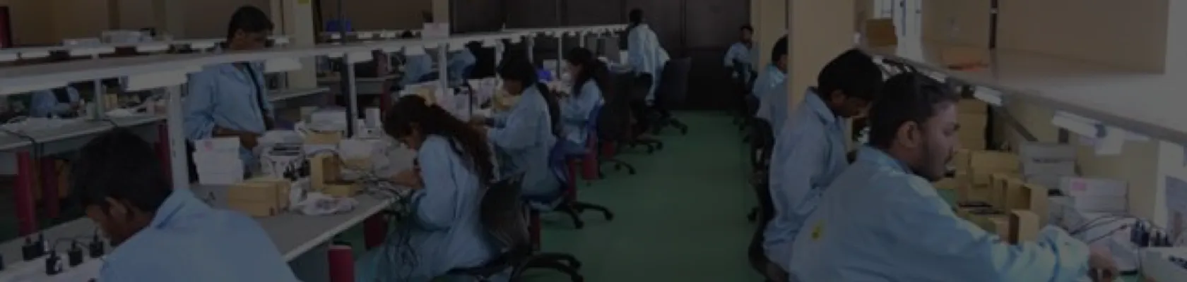 Engineers at work on the e-Mag ESD-controlled repair floor in Bangalore